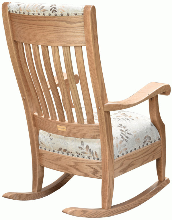 Back of light wooden rocking chair with cushion