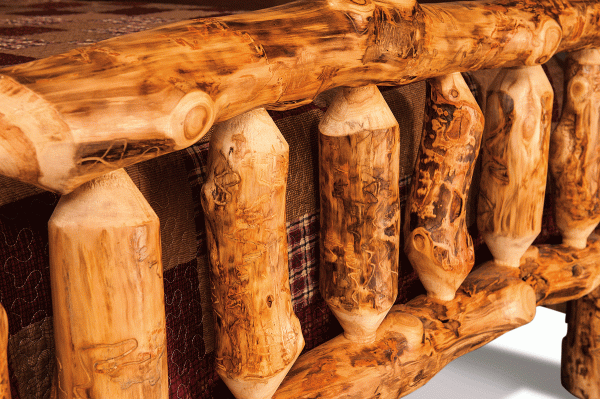 Close up of wood posts on rustic bed