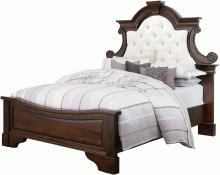 Ornate Bed With White Tufted Headboard