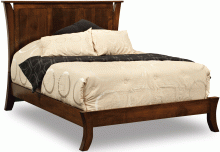 dark wooden bedframe with rounded legs