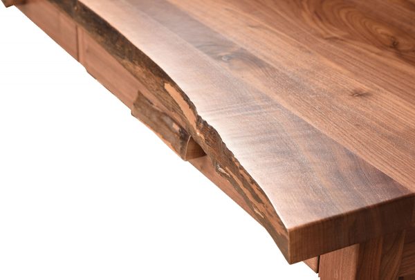 The corner of a wooden desk