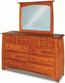 wooden dresser with drawers and a mirror