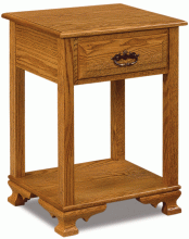 light wooden end piece with a drawer and a cubby space for storage