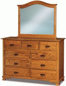 light wooden dresser with drawers and a mirror