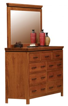 light brown wooden dresser with multiple drawers and a mirror