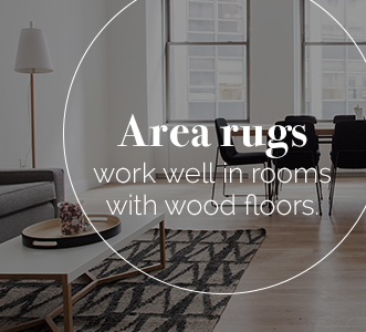 tone down wood with area rugs
