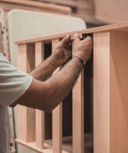 man assembling furniture