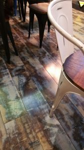 Hardwood floors and metal chair