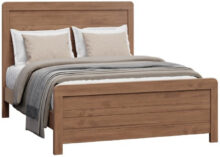 Light wooden Amish bed frame with neutral bedding and pillows.